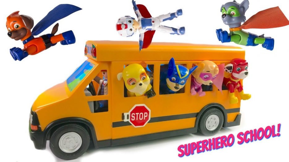 Paw Patrol Rides School Bus to Superhero Super Pup School Wheels on the Bus Song