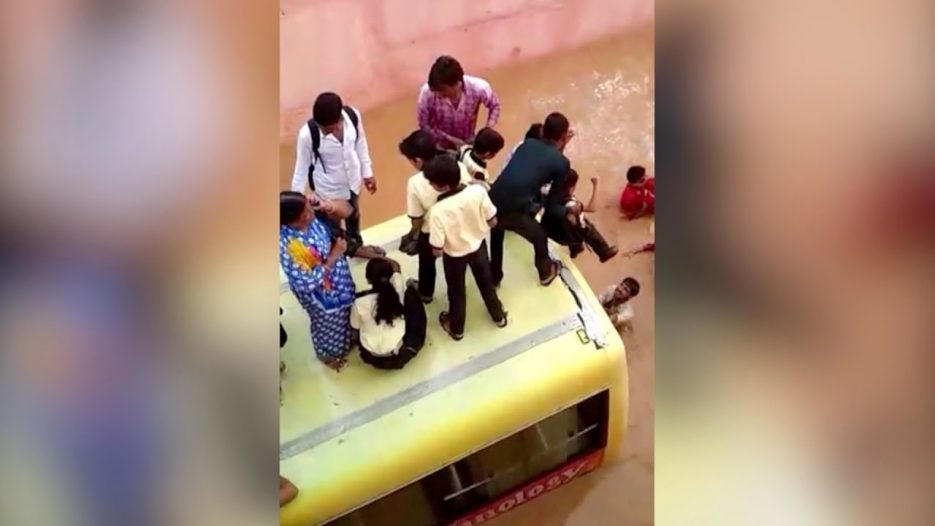 Schoolchildren rescued from submerged bus in India