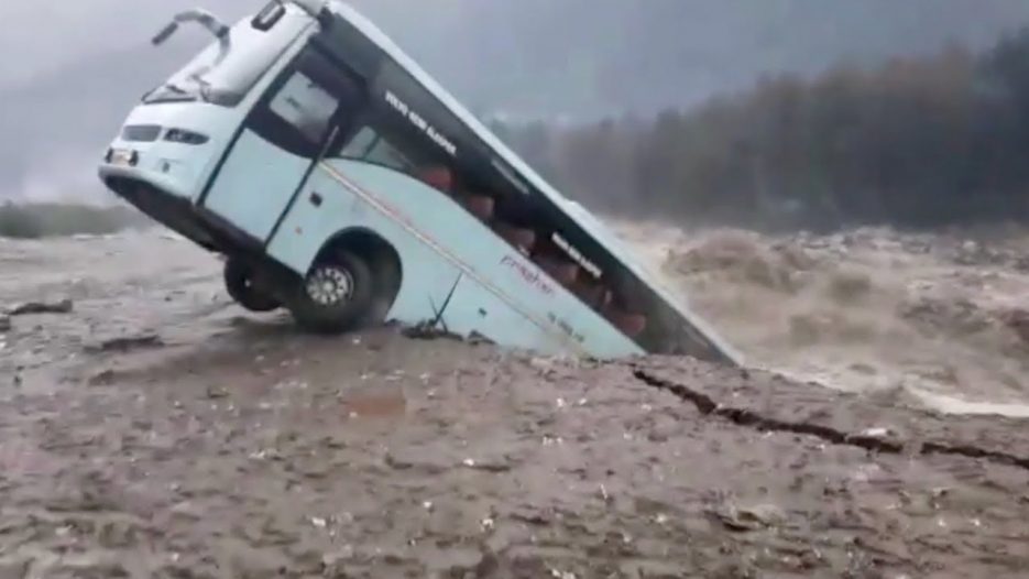 Bus swept away by floods in northern India
